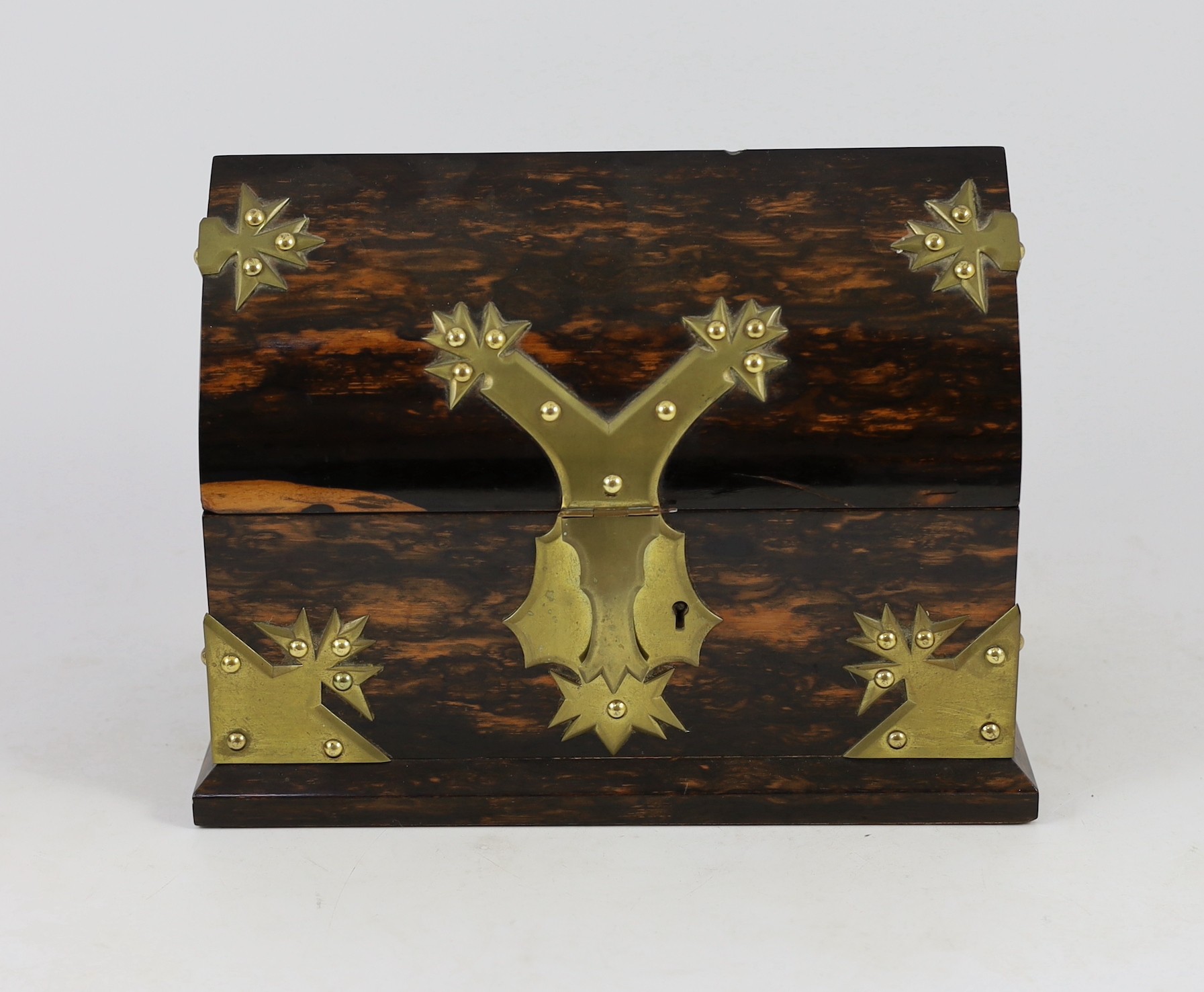 A Victorian brass mounted coromandel wood stationery casket with matching blotter, a similar book rack and gallery tray, 26cm